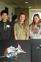 Geelong Lutheran College students Timothy Newton and Isabella B showing off their artwork with Rachael Beecham